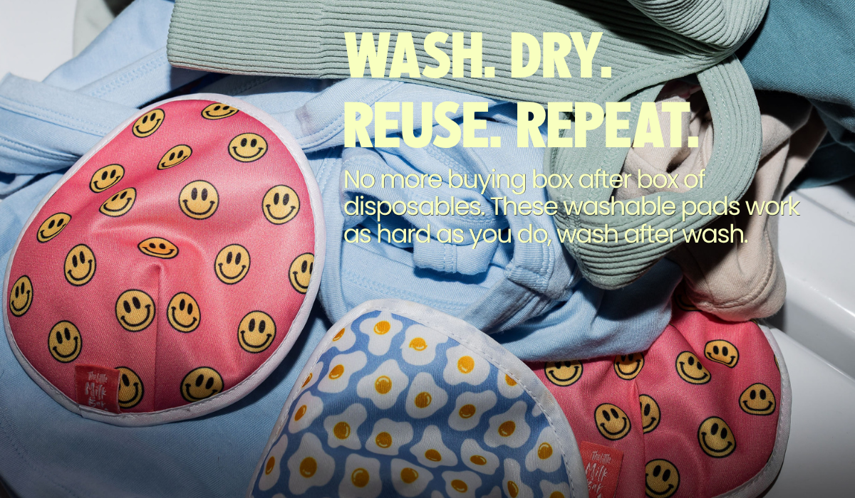 Reusable washable nursing pads in smiley face and egg prints in a laundry pile — an eco-friendly alternative to disposable nursing pads