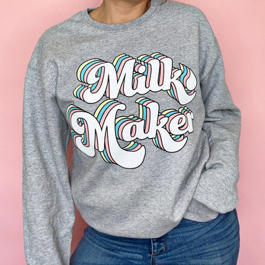 https://thelittlemilkbar.com/cdn/shop/products/Rainbow_Milk_Maker_Sweatshirt_for_breastfeeding_moms_from_The_Little_Milk_Bar_1_384x384.jpg?v=1668440694